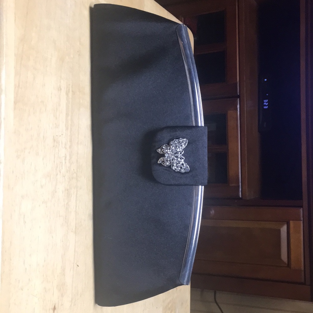 Dressy black satin clutch bag.